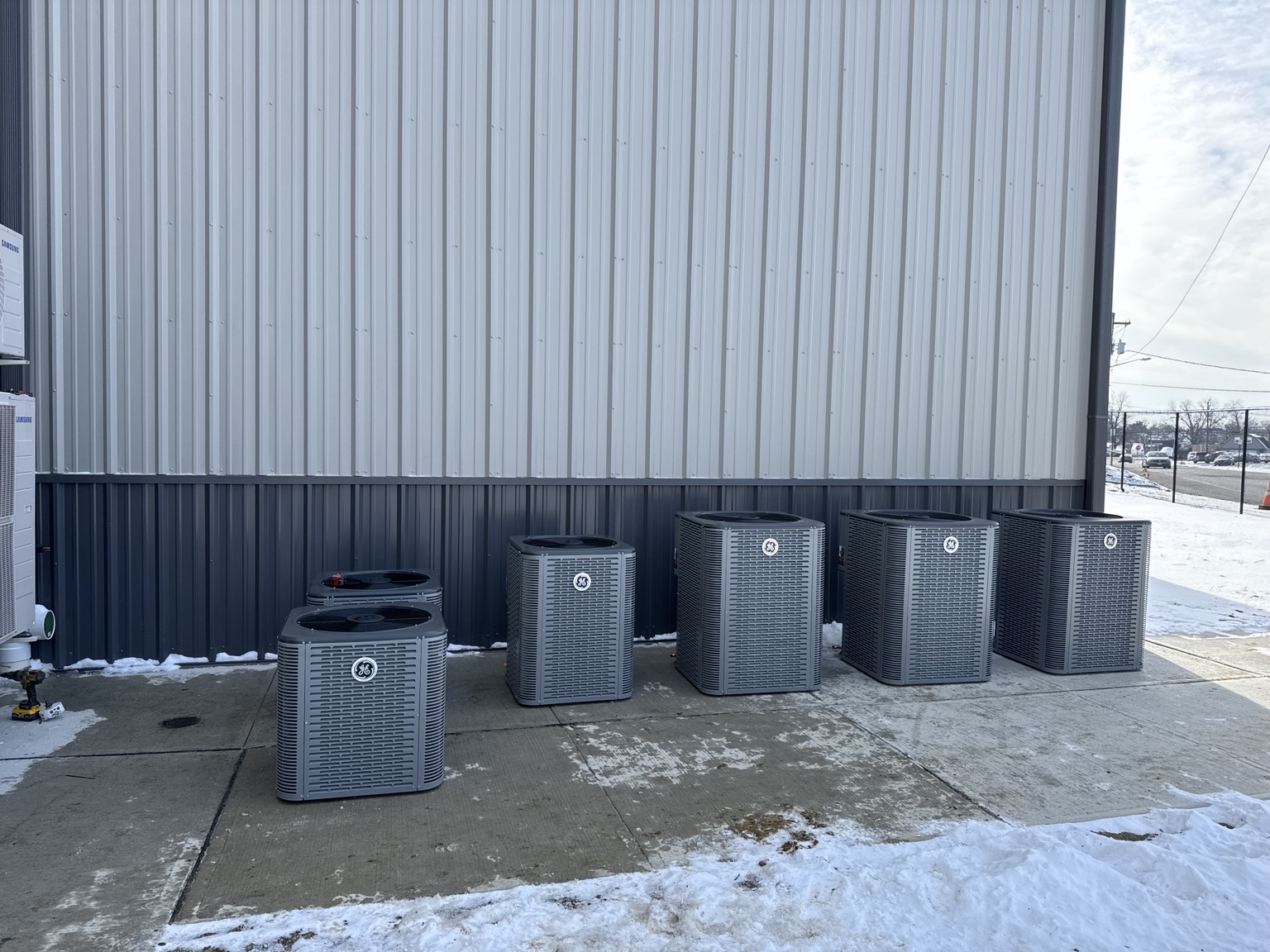 Multiple GE outdoor HVAC systems installed at a commercial property